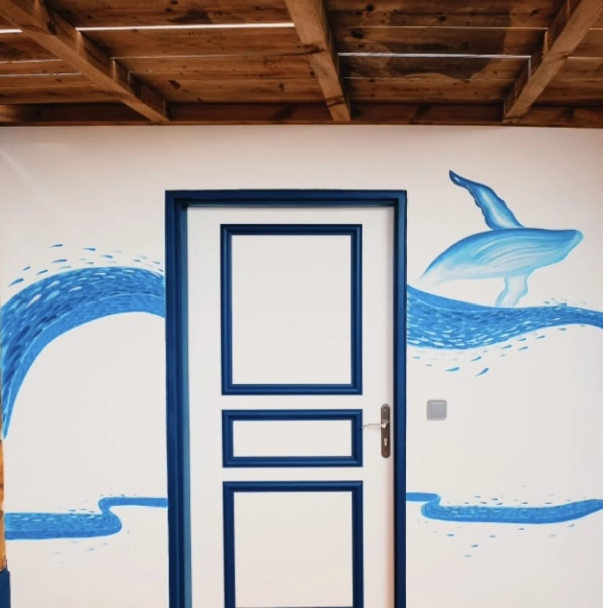 Détail d'une fresque murale banc de poissons par Lusea à La Réunion